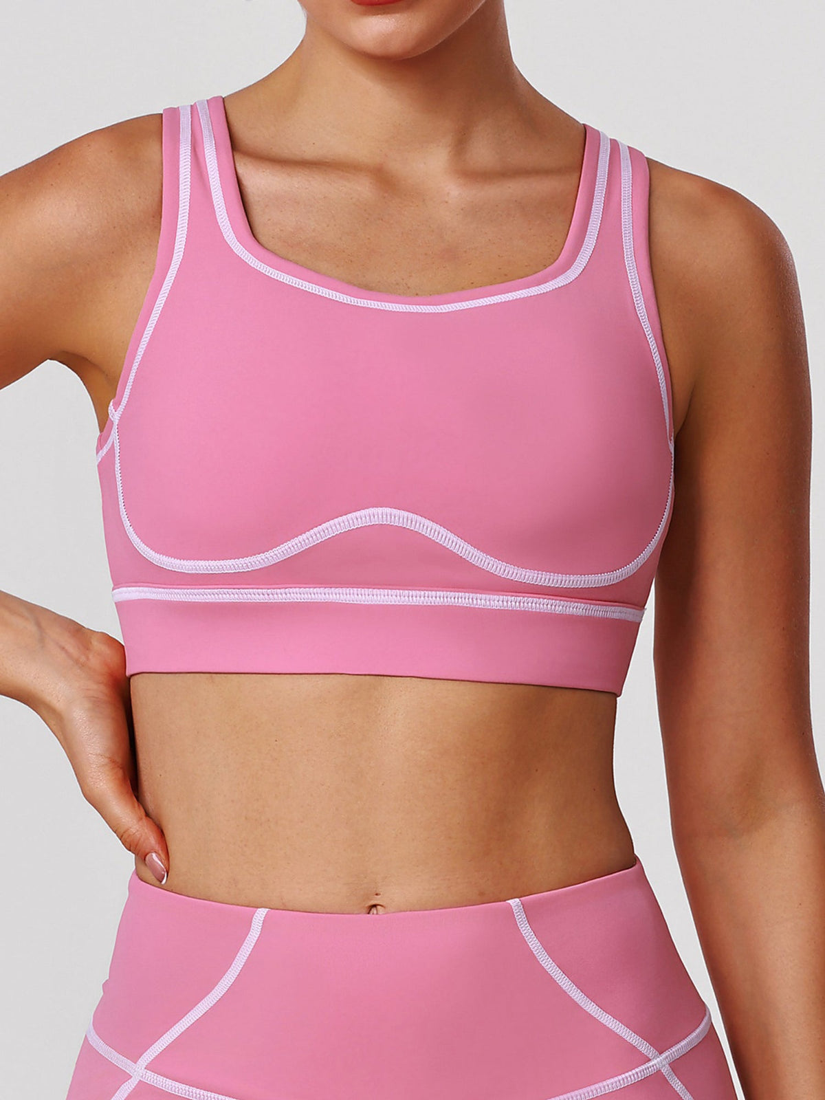Black Sports Bra with Contrast Piping and Open Back
