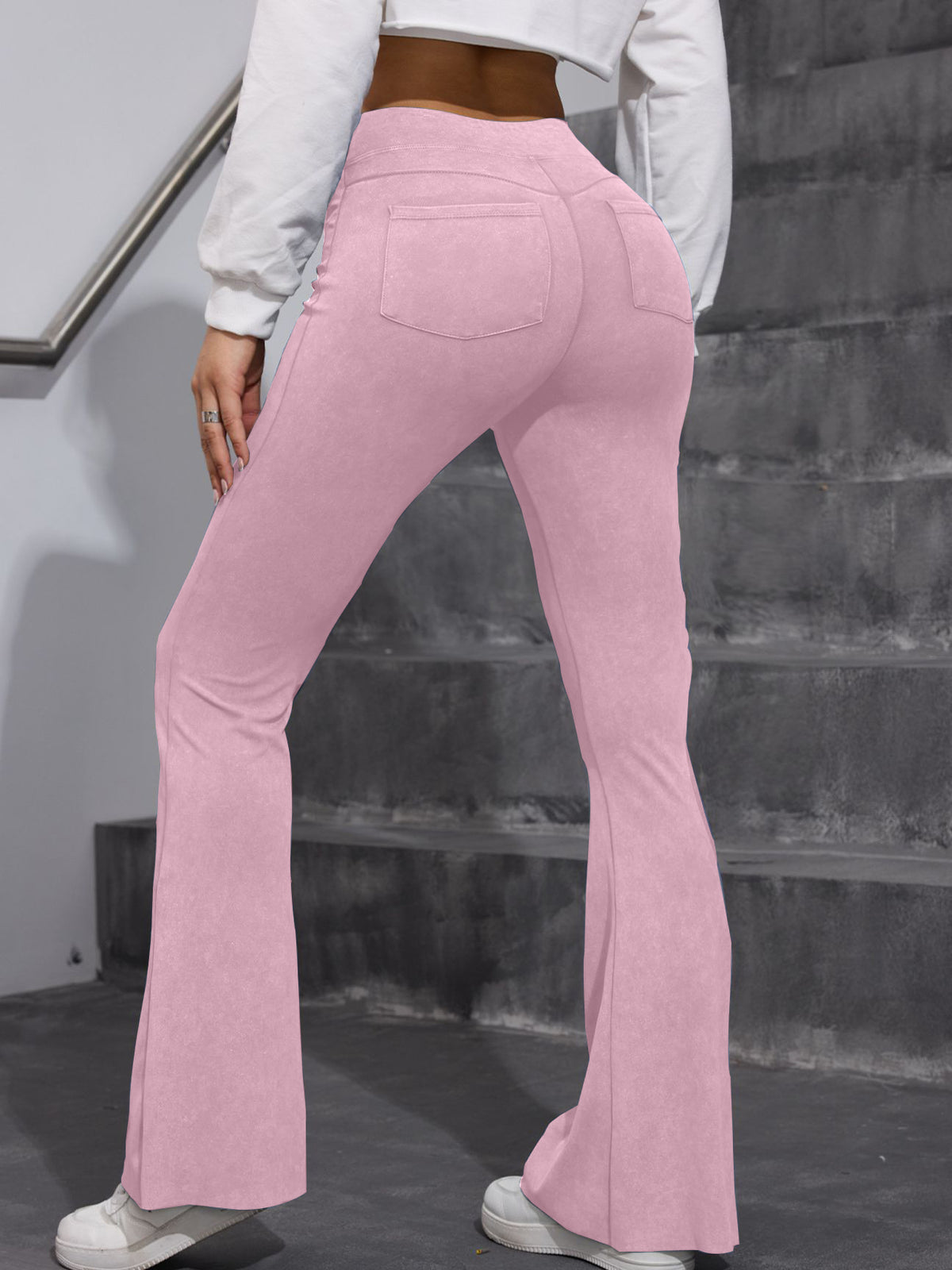 Hip-Lift-Denim-elastische enge Schlaghose