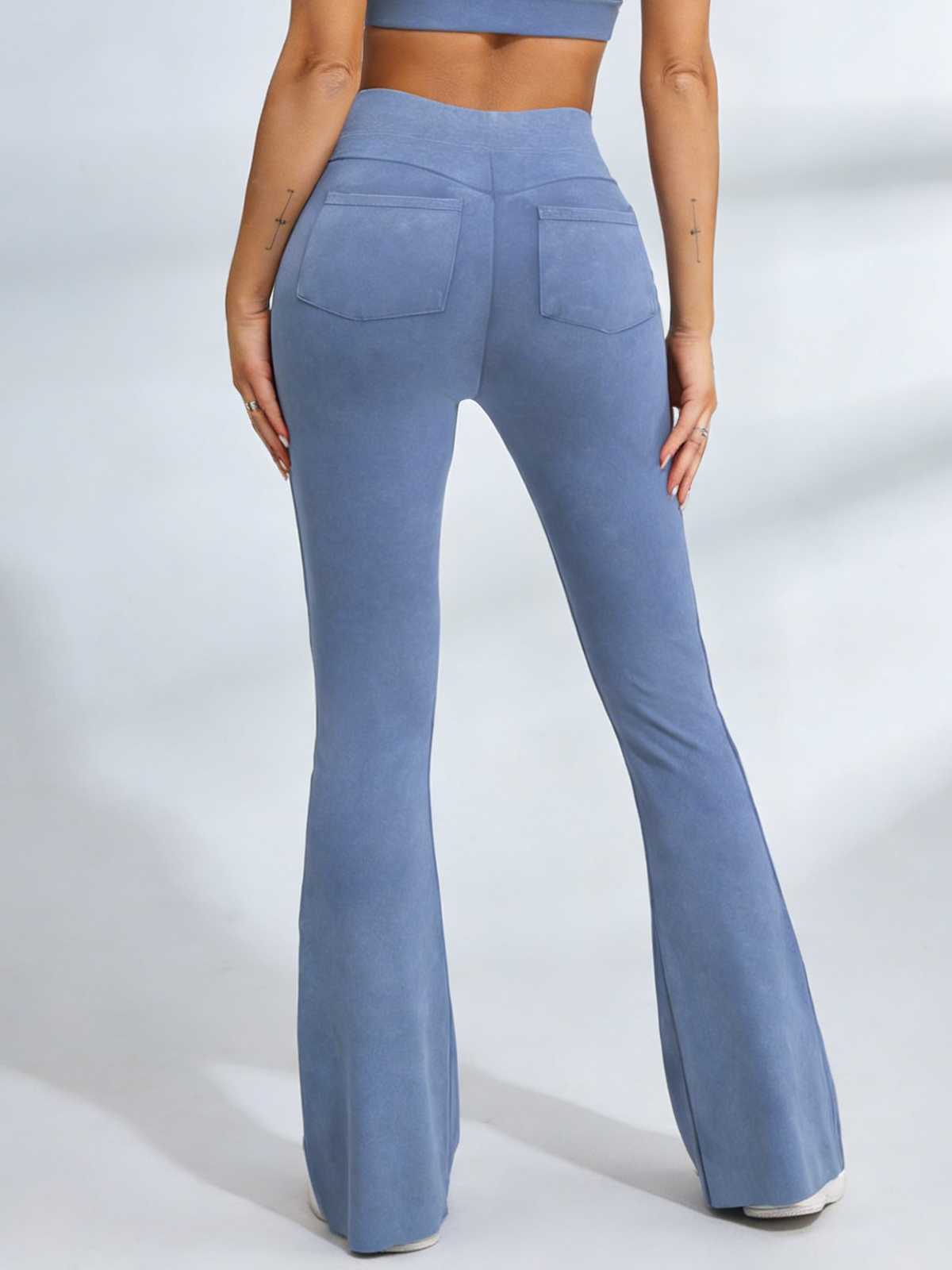 Hip-Lift-Denim-elastische enge Schlaghose