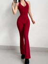 ZASUWA Female Sexy Backless Deep V Collar Flare Jumpsuit