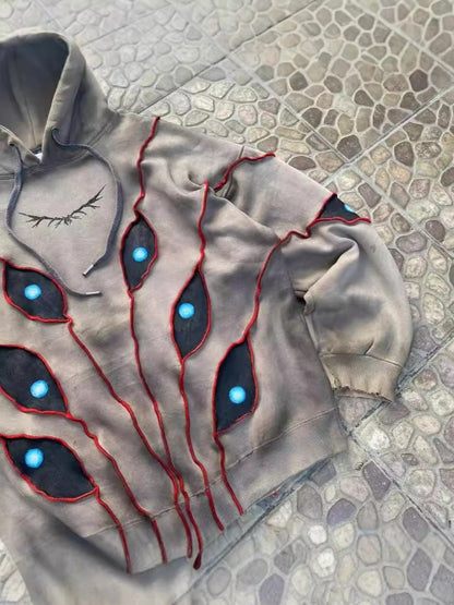 Vintage Distressed Multi-Eye Patchwork Hoodie
