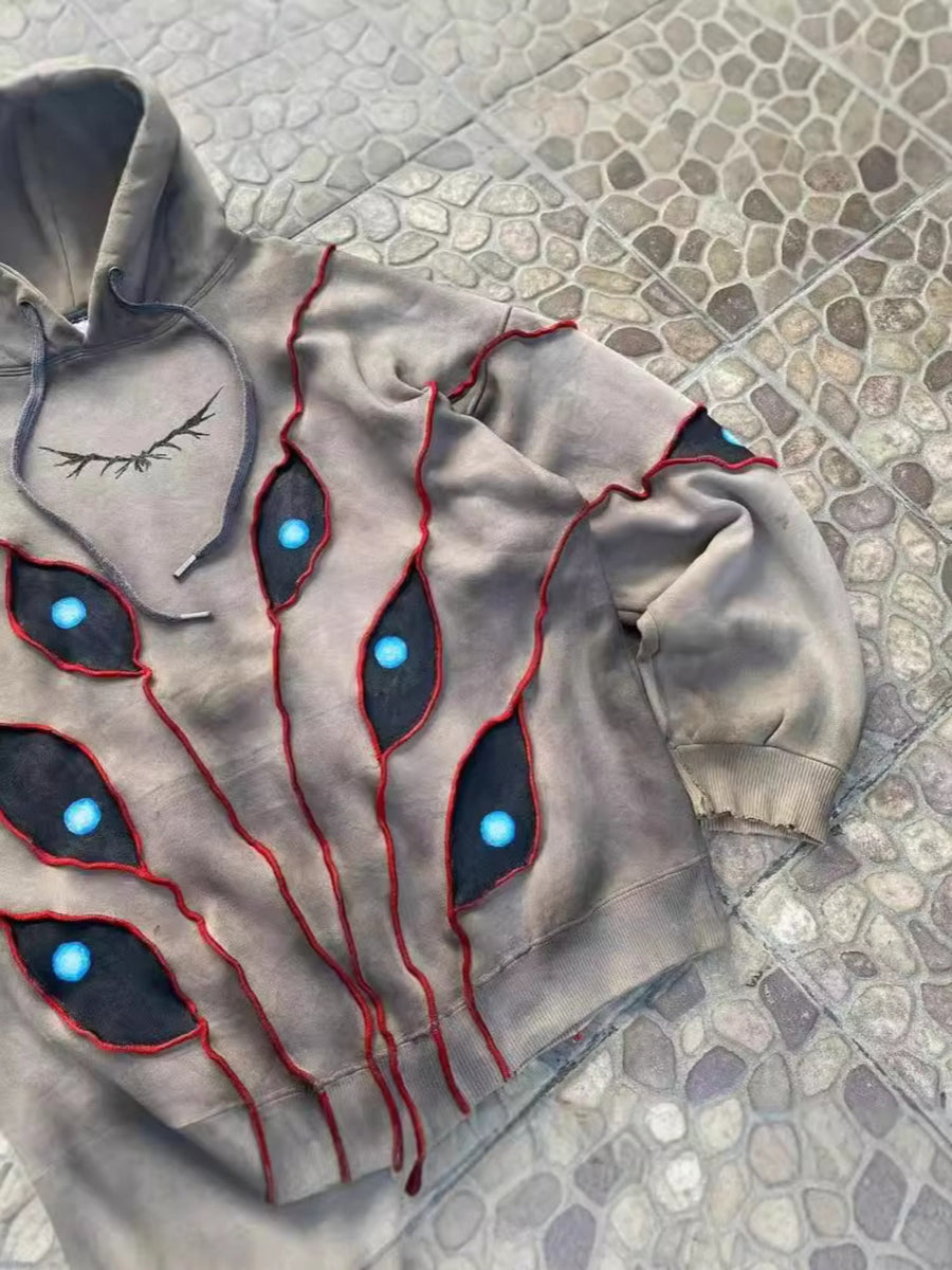 Vintage Distressed Multi-Eye Patchwork Hoodie
