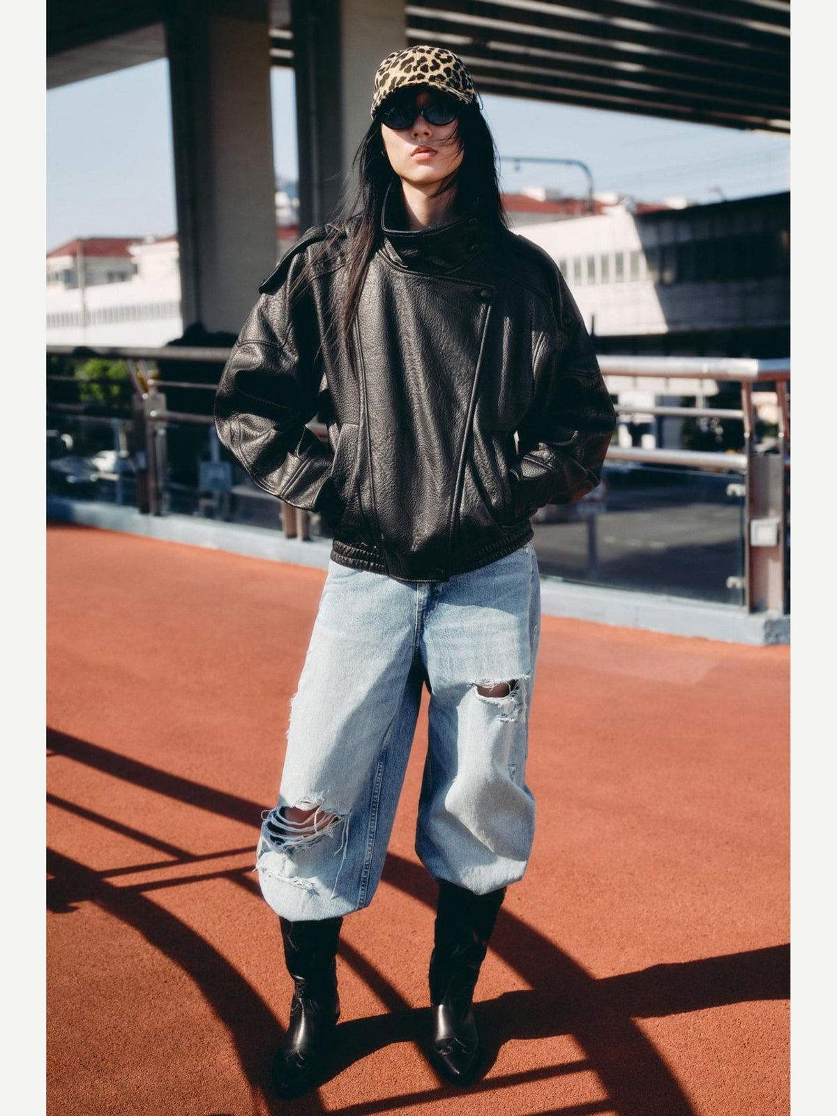 Women's Oversized Faux Leather Bomber Jacket with Asymmetrical Closure