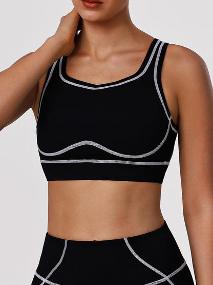 Black Sports Bra with Contrast Piping and Open Back