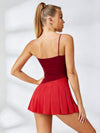 Asymmetrical Cut‑Out Top & Strappy‑Detail Pleated Skirt Set